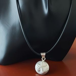 Leather necklace with steeling silver pendant